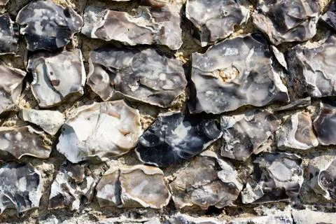 Flint wall texture background Stock Photos