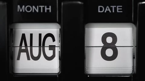 Flip calendar with a date change from eighth August to ninth of August. close up Stock Footage 269784566