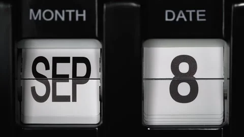 Flip calendar with date change from eighth September to ninth September close up Stock Footage 270350790