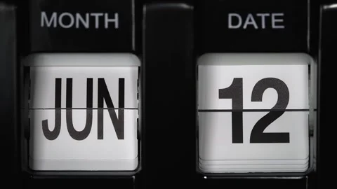 Flip calendar with date change from eleventh June to twelfth of June. close up. Stock Footage 267934110