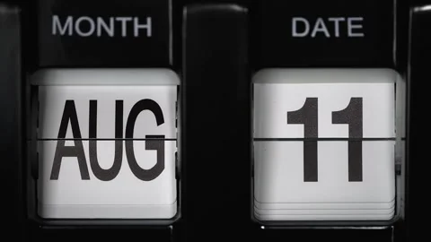 Flip calendar with date change from eleventh August to twelfth August. close up. Stock Footage 269859416