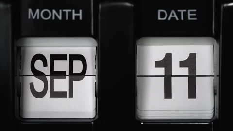 Flip calendar with date change eleventh September to twelfth September. close up Stock Footage 270413293