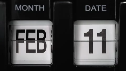 Flip calendar with date change eleventh February to twelfth February. close up. Stock Footage 272853196