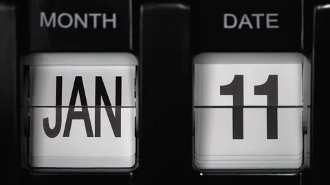 Flip calendar with date change from eleventh January to twelfth January close up Stock Footage 274125041