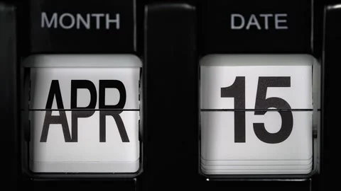 Flip calendar with date change from fifteenth April to sixteenth April. close up Stock Footage 266532390
