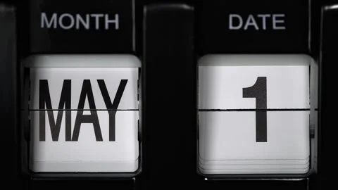 Flip calendar with date change from first of May to the second of May. close up Stock Footage 266914733