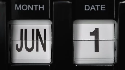 Flip calendar with date change from first of June to second of June. close up. Stock Footage 267698444