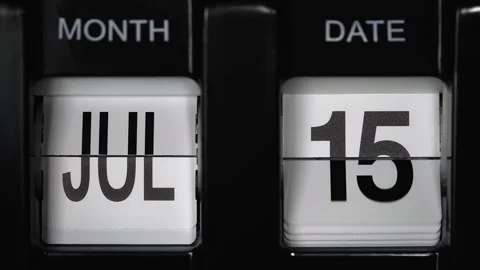 Flip calendar with date change fourteenth of July to fifteenth of July. close up Stock Footage 268919092