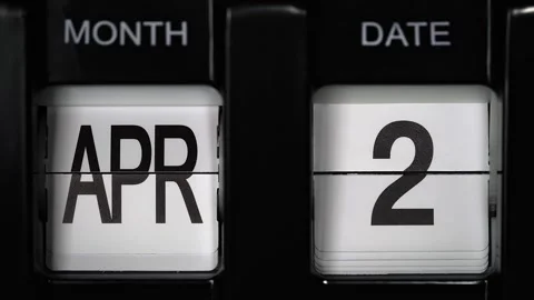 Flip calendar with date change from second April to the third April. close up. Stock Footage 266149631