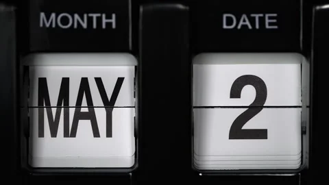 Flip calendar with date change from second of May to the third of May. close up Video stock 266914735
