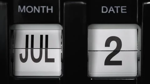Flip calendar with a date change from second of July to third of July. close up. Stock Footage 268655824