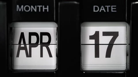 Flip calendar with date change seventeenth April to eighteenth April. close up. Stock Footage 266532389