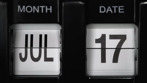 Flip calendar with date change seventeenth July to eighteenth of July. close up. Stock Footage 269088893