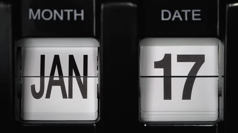 Flip calendar with date change from seventeenth January to eighteenth of January Stock Footage 274172572