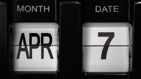 Flip calendar with a date change from seventh April to eighth April. close up. Video stock 266205694