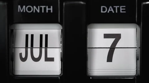 Flip calendar with date change from seventh of July to eighth of July. close up. Stock Footage 268775656
