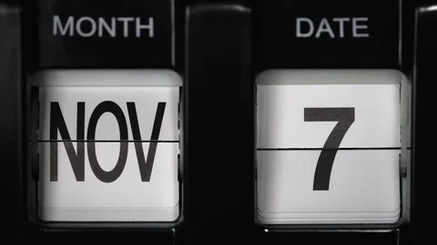 Flip calendar with date change seventh of November to eighth November. close up. Stock Footage 271608205