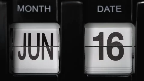 Flip calendar with date change sixteenth June to seventeenth of June. close up. Stock Footage 268109936
