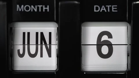 Flip calendar with date change from sixth of June to seventh of June. close up. Stock Footage 267858224