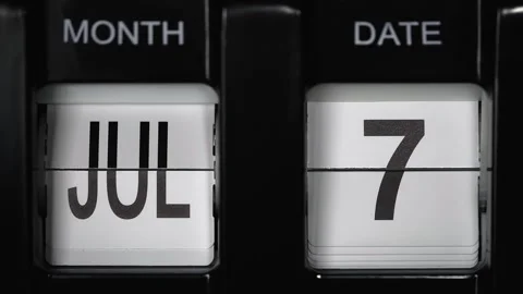 Flip calendar with a date change from sixth of July to seventh of July. close up Stock Footage 268775657