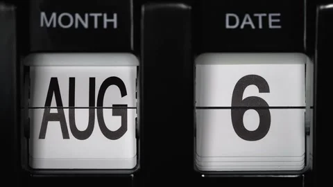 Flip calendar with date change from sixth August to seventh of August. close up. Stock Footage 269784557