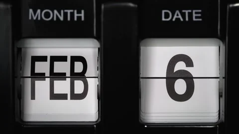 Flip calendar with date change from sixth February to seventh February. close up Stock Footage 272705138