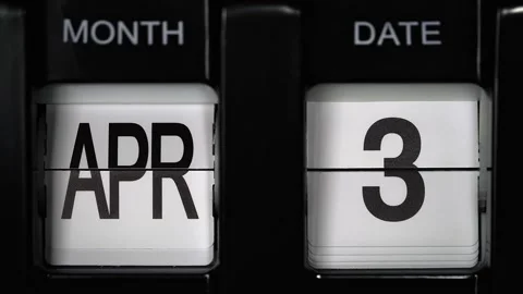 Flip calendar with a date change from third of April to fourth April. close up. Video stock 266149628