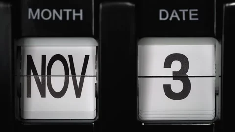 Flip calendar with a date change third of November to fourth November. close up. Stock Footage 271430781