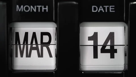 Flip calendar with date change from thirteenth March to fourteenth March closeup Stock Footage 265574229