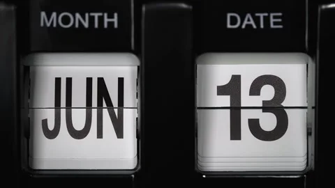 Flip calendar with date change from thirteenth June to fourteenth June. close up Stock Footage 267934109