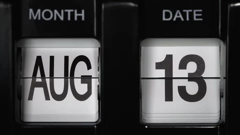 Flip calendar with date change thirteenth August to fourteenth August. close up. Stock Footage 269859413