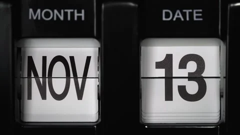 Flip calendar with date change thirteenth of November to fourteenth of November. Stock Footage 271700689