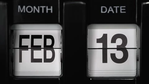 Flip calendar with date change thirteenth of February to fourteenth of February. Stock-Footage 272853190