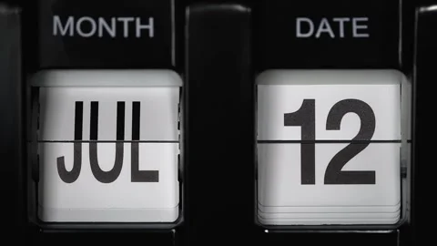 Flip calendar with date change twelfth of July to thirteenth of July. close up. Stock-Footage 268919094