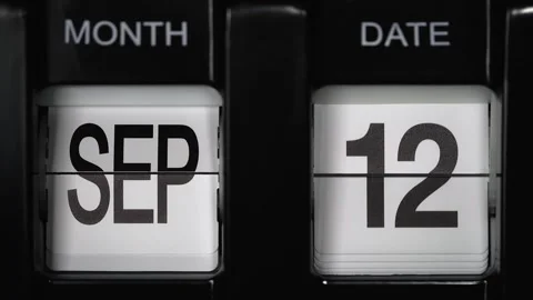 Flip calendar with date change twelfth September to thirteenth September closeup Video stock 270413296