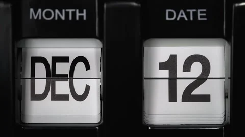 Flip calendar with date change twelfth December to thirteenth December. close up Stock Footage 273529680