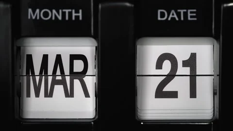 Flip calendar with date change twenty first March to twenty second March closeup Stock-Footage 265820144