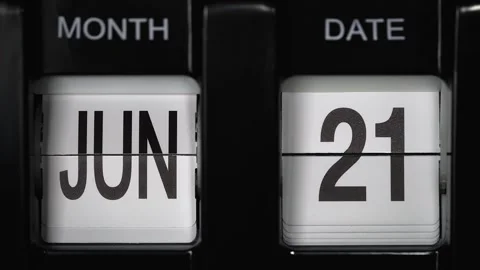 Flip calendar with date change twenty first June to twenty-second June. close up Stock Footage 268356673