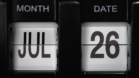 Flip calendar with date change twenty-sixth July to twenty-seventh July close up Video stock 269249013