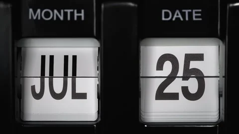 Flip calendar with date change twenty-fifth July to twenty-sixth July. close up. Stock Footage 269249015
