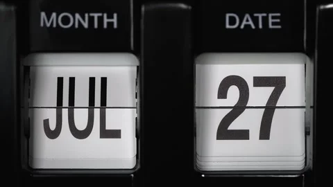 Flip calendar date change twenty-seventh July to twenty-eighth July. close up. Stock Footage 269454630