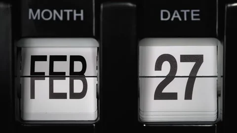 Flip calendar with date change twenty-seventh February to twenty-eighth February Video stock 273189901