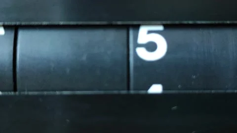 A flip clock flips quickly through the days of the month from 01 Stock Footage 138160328