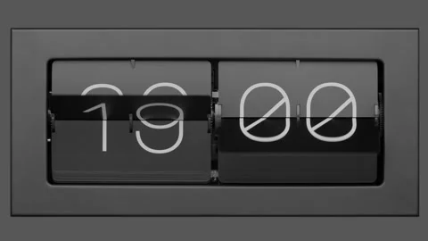 Flip clock quickly flips. Slow motion. Close up. 4K Stock Footage 265669299