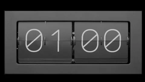 Flip clock quickly flips. Slow motion. Close up.  Stock Footage 265669332