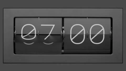 Flip clock quickly flips. Slow motion. Close up.  Stock Footage 265669386