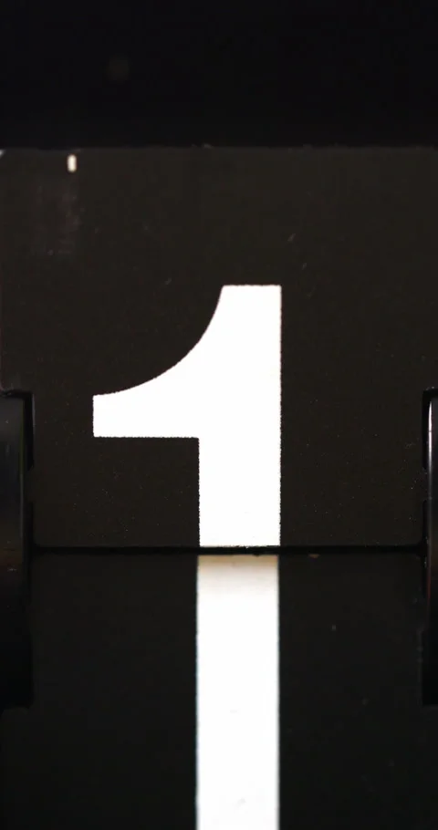 Flip clock tells time Change the number 1 sign to number 2. Stock Footage 255257028