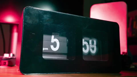 Flip Clock Time-Lapse in 24 Hours with Red Ambient Lighting on Desk Stock Footage 315520436