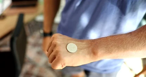 Flip coin with your hand and heads and tails Stock Footage 213645420