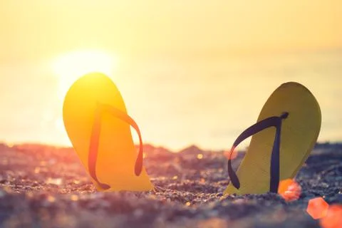 Flip-flop on the beach Stock Photos